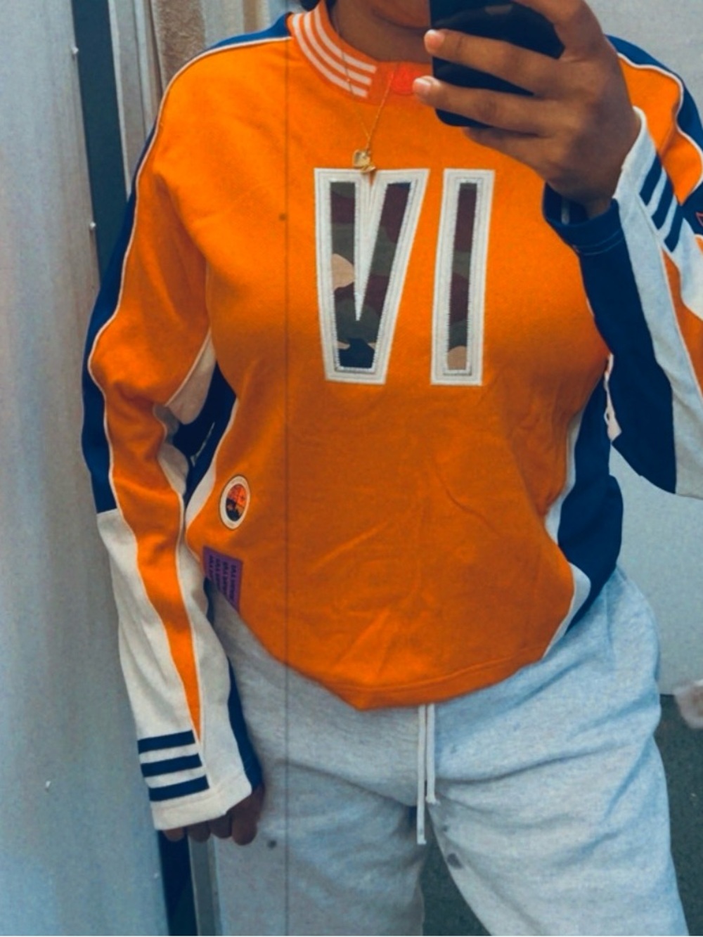 IVY PARK Orange Long Sleeve Top with Purple & White Accents